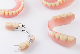 Dentures and partial dentures