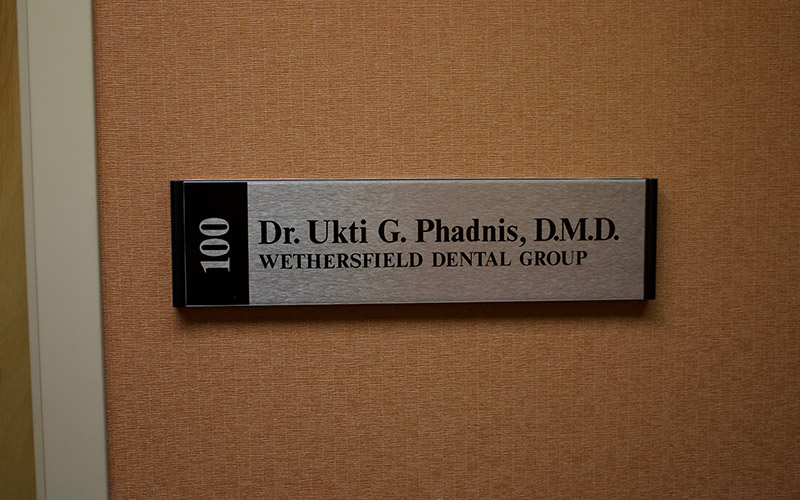Dr. Utki Phadnis plaque on wall